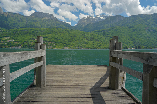 Fototapeta Naklejka Na Ścianę i Meble -  Beautiful Alps landscape from a lake dock