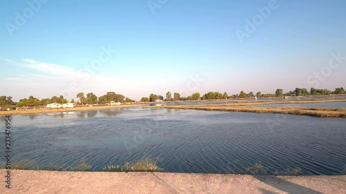 Drone landing view of Tourlida in Mesologgi Greece. View of Pelades houses on piles inside the lagoon island. photo