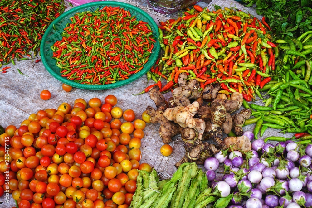 Colorful peppers and vegetables at a market in rural Southeast Asia