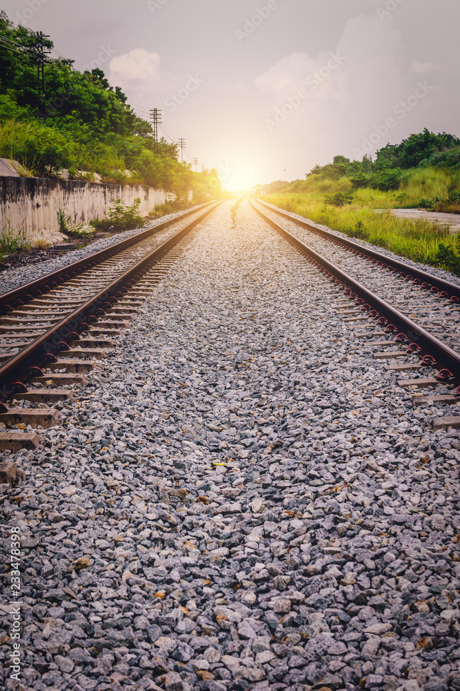 Railroad tracks in the setting sun