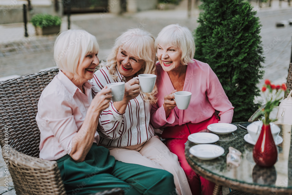 waist-up-photo-of-old-ladies-females-having-rest-and-drinking-tea