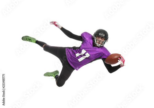 American football player catching ball on white background © New Africa