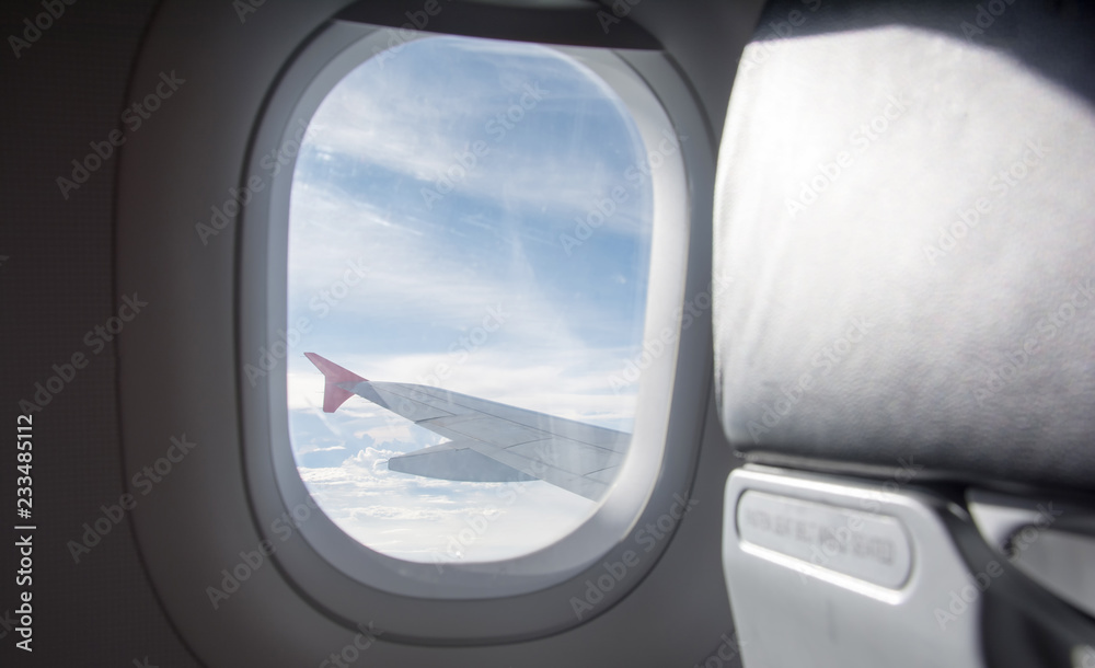 window at flying airplane