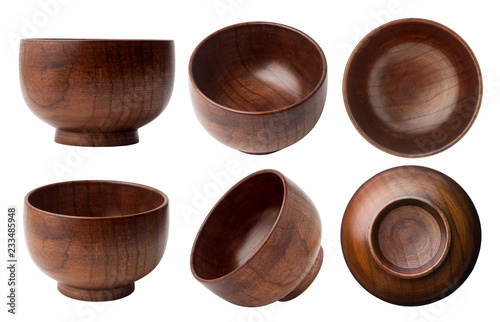 Empty wooden bowl isolated on white background