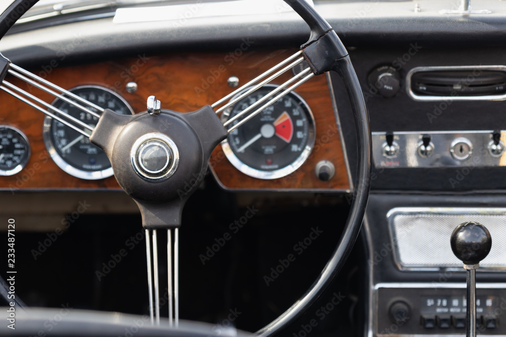 Obraz premium Steering wheel in vintage car