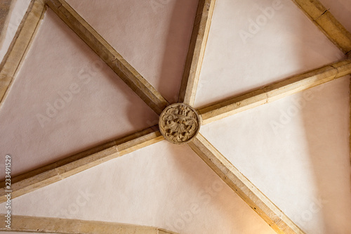 The ribbed vault center in the austere cells of the Convent of Christ grand dormitory