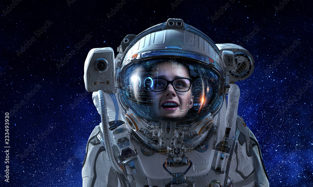 Attractive woman in spacesuit Attractive woman in spacesuit