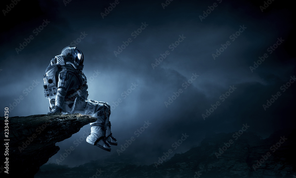 Fototapeta premium Astronaut in spacesuit. Mixed media