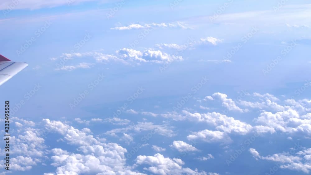 Wing airplane and cloud in the sky. slow motion. 3840x2160