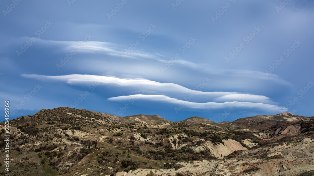 Amazing beautiful cloud over the mountain range Amazing beautiful cloud over the mountain range