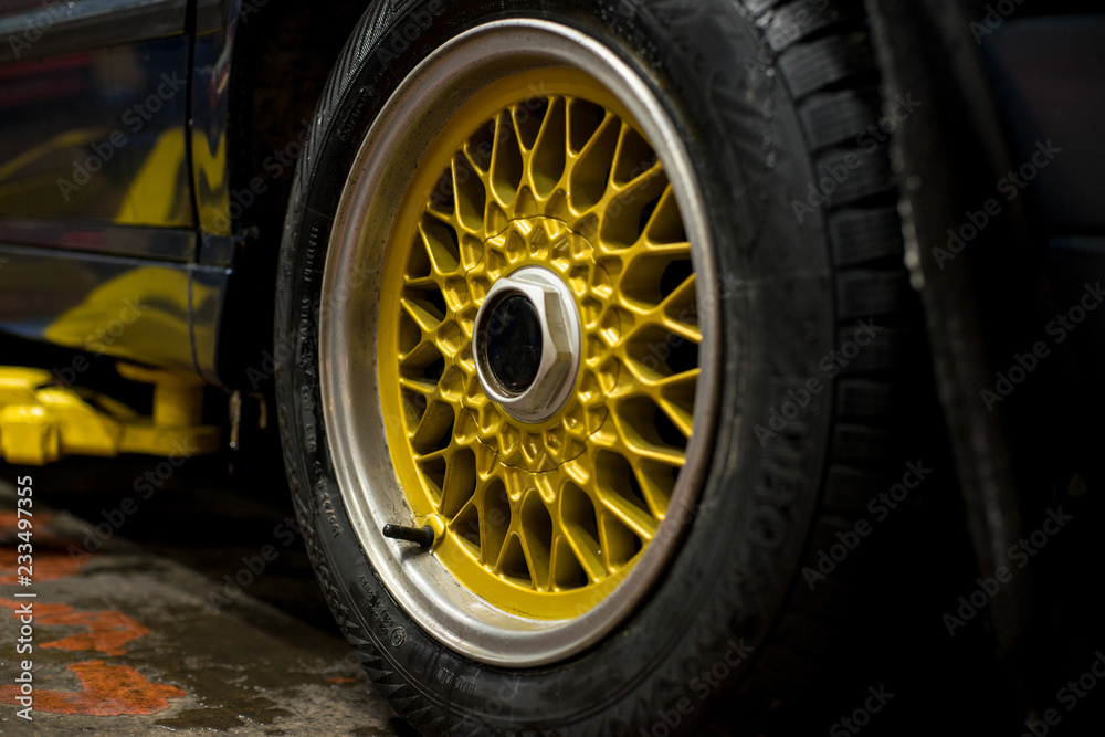 Legendary alloy net sport rims on beautiful wheels in polished and gold color