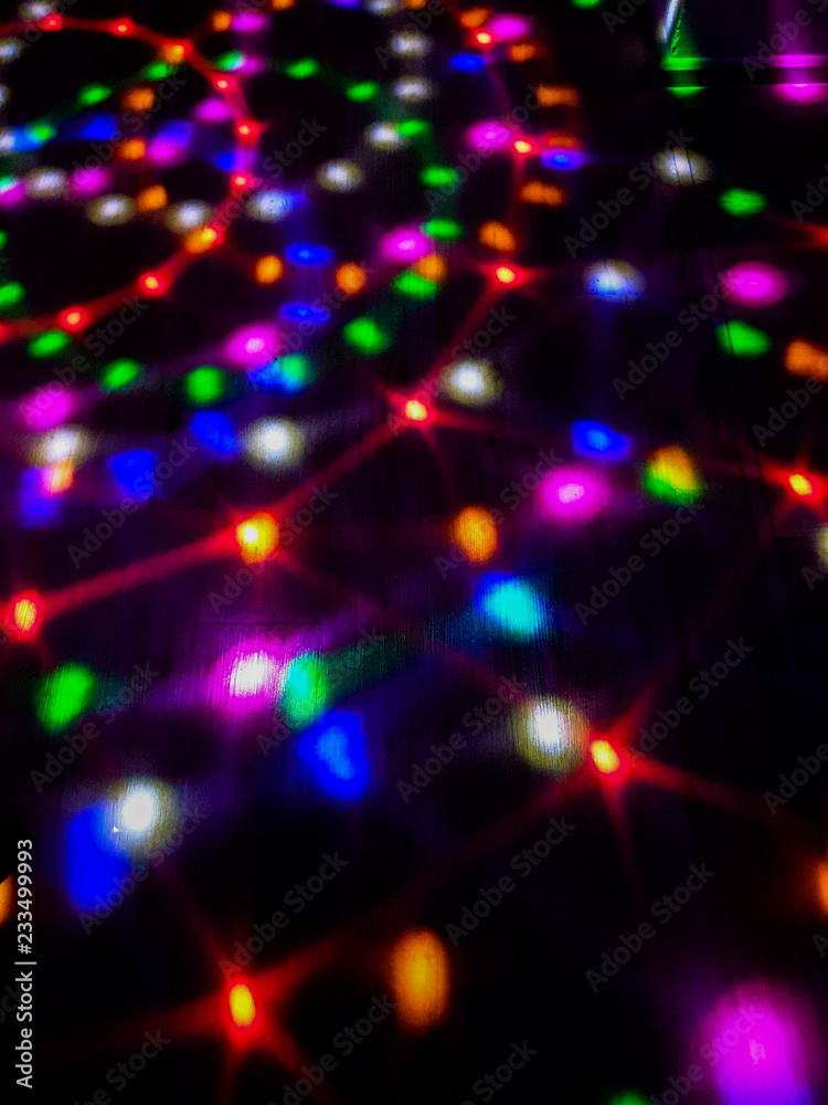 disco light on dance floor.