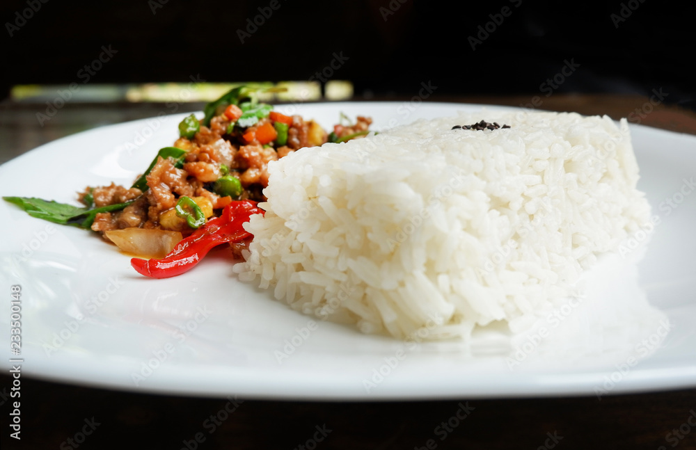 Stir fried pork basil top view / Thai Style spicy food holy basil pork fried rice recipe (Phat Kra Pow Moo) Stir fried pork basil top view / Thai Style spicy food holy basil pork fried rice recipe (Phat Kra Pow Moo)