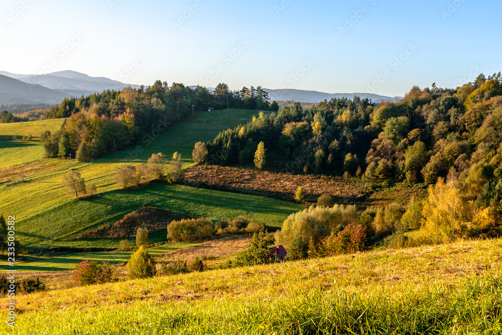 Naklejka premium Polanczyk, Bieszczady mountains, Poland - views during sunrise on Solina Lake from hill near Polanczyk town (south-east region in Poland)