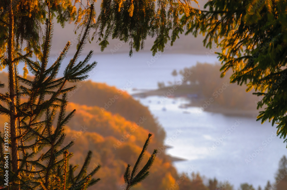 Fototapeta premium Polanczyk, Bieszczady mountains, Poland - views during sunrise on Solina Lake from hill near Polanczyk town (south-east region in Poland)