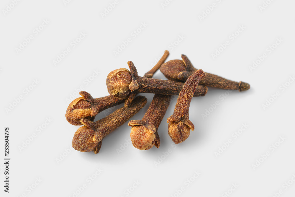 A group of cloves on a white background A group of cloves on a white background