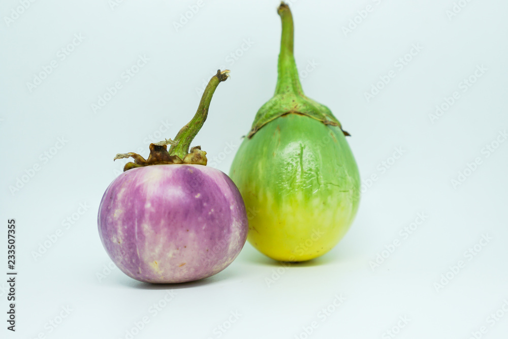 Withered eggplant with shrunken skin on white background Withered eggplant with shrunken skin on white background
