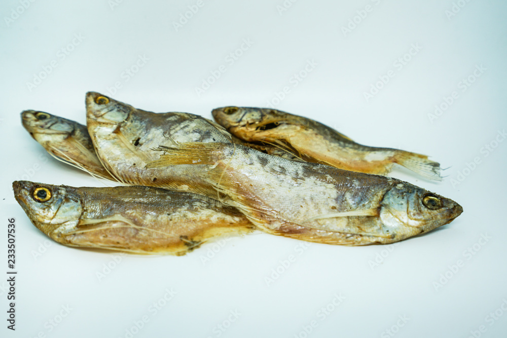 Dried fish, Dried pickled fish on white background Dried fish, Dried pickled fish on white background