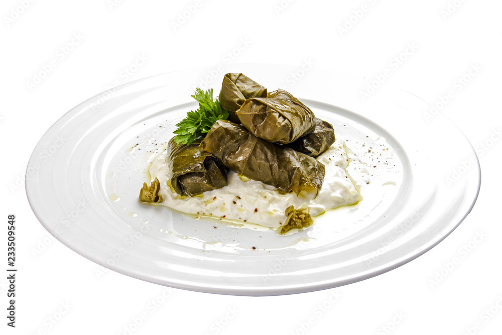 Dolma - stuffed grape leaves with rice and meat. Traditional Caucasian, Ottoman, Turkish and Greek cuisine