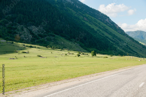 Road and mountains in Dombay, Karachay Cherkessia, Russia photo