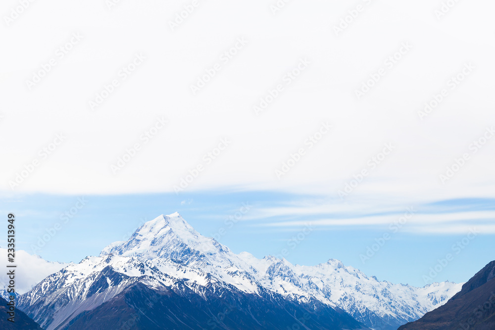New Zealand Aoraki Mount Cook with snow capped under the cloud sky copy space