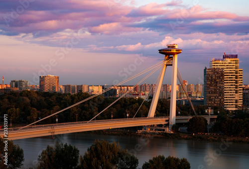 Canvas Print Bridge (Most SNP) linking both side of Bratislava at sunset, looking like UFO