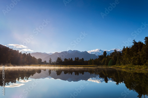 Perfectly reflection of Mount Cook on the Lake Matheson in Fox Glacier, West Coast, New Zealand in the morning
