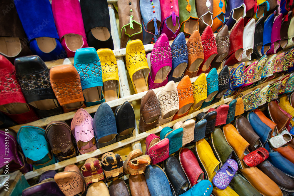 Colorful handmade leather slippers (babouches) on a market in Marrakech, Morocco
