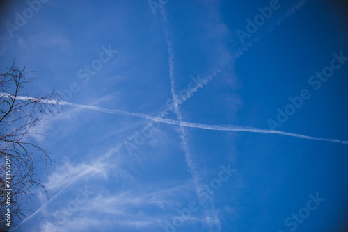 blue sky with traces from planes 