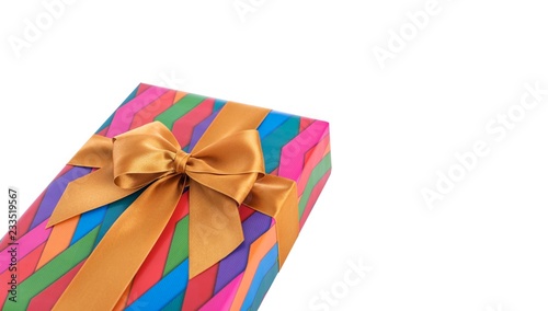 Gift box in bright wrapping paper. Close-up.