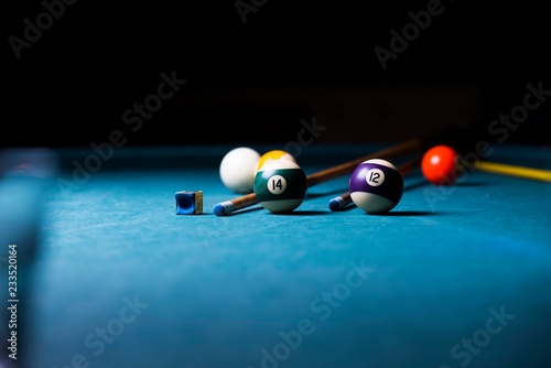 Fototapeta billiard table with cue and balls. billiard background