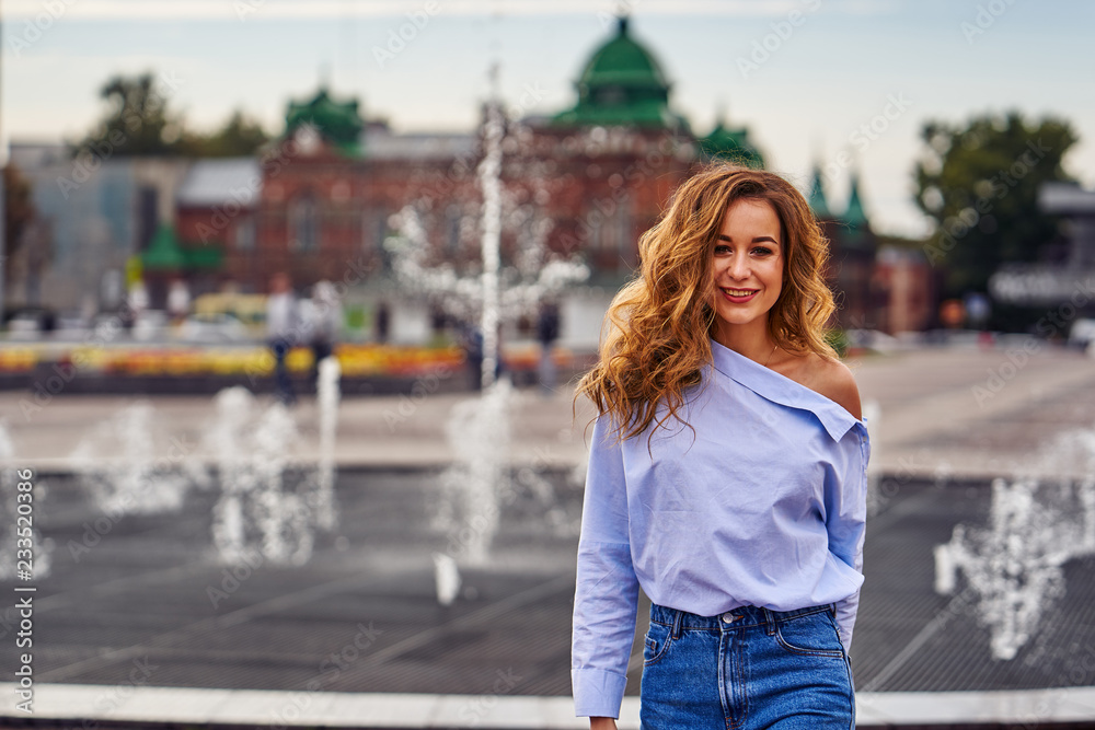 Portrait of a young beautiful woman with brown hair and brown eyes. Close-up. Portrait of a young beautiful woman with brown hair and brown eyes. Close-up.
