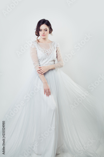 Glamorous bride portrait. Perfect woman in white dress