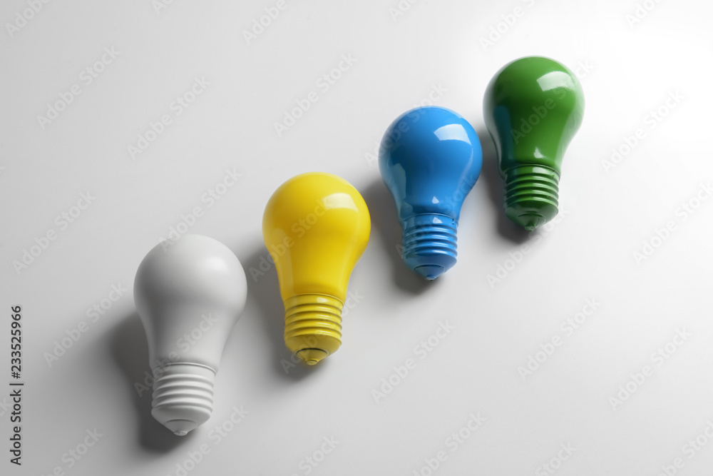 Painted light bulbs on white background Painted light bulbs on white background