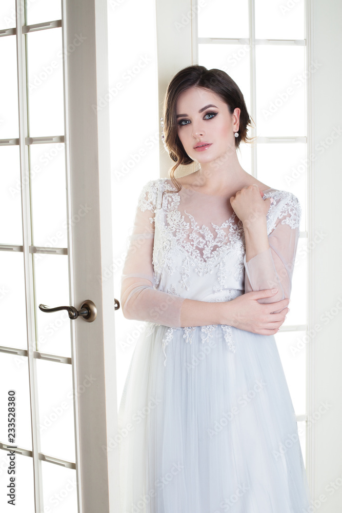 Sensual woman with makeup and bridal hairstyle. Pretty fiancee portrait Sensual woman with makeup and bridal hairstyle. Pretty fiancee portrait