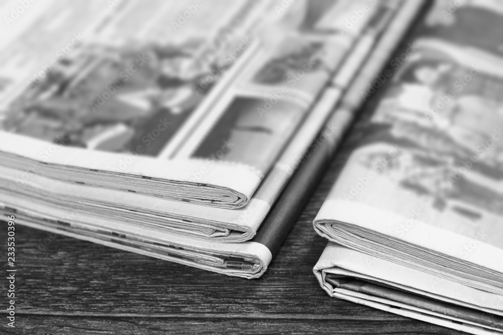Newspapers and Magazines with Latest News (Headlines, Articles and Photos), Concept for Business and Media Background Newspapers and Magazines with Latest News (Headlines, Articles and Photos), Concept for Business and Media Background