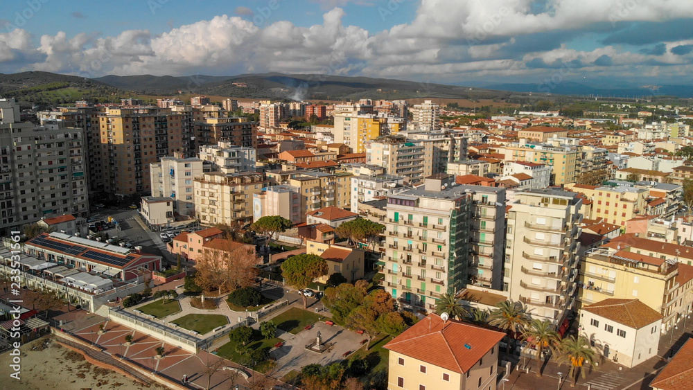 Panoramic aerial view of Follonica, Italy. Coastline of Tuscany with town and ocean