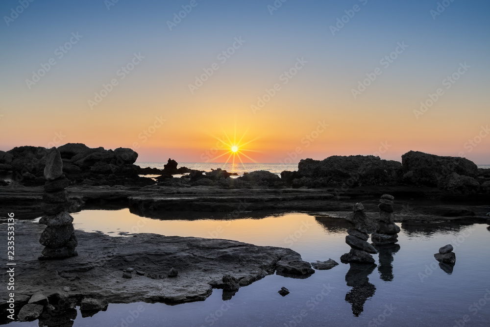 Fantastic sunrise in Faliraki beach, Rhodes Greece Fantastic sunrise in Faliraki beach, Rhodes Greece
