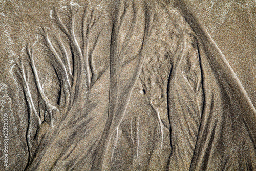 Sandtextur von Wellen erstellt photo