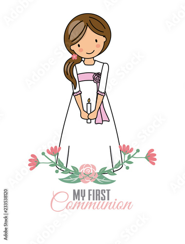 my first communion girl. Pretty little girl with communion dress and flowers