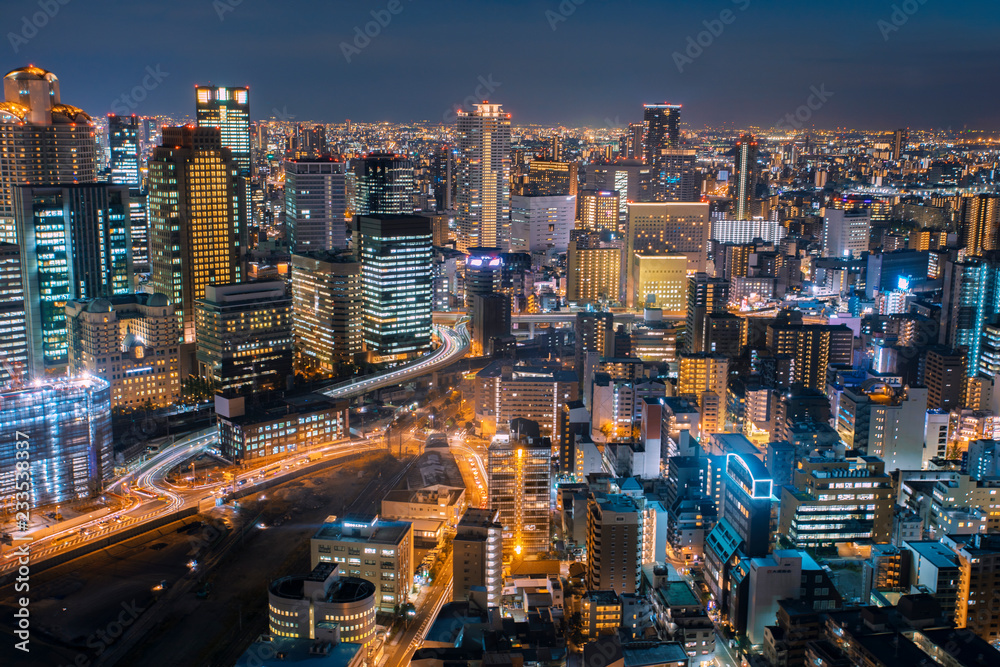 night cityscape of osaka urban skyscraper from top of umeda building