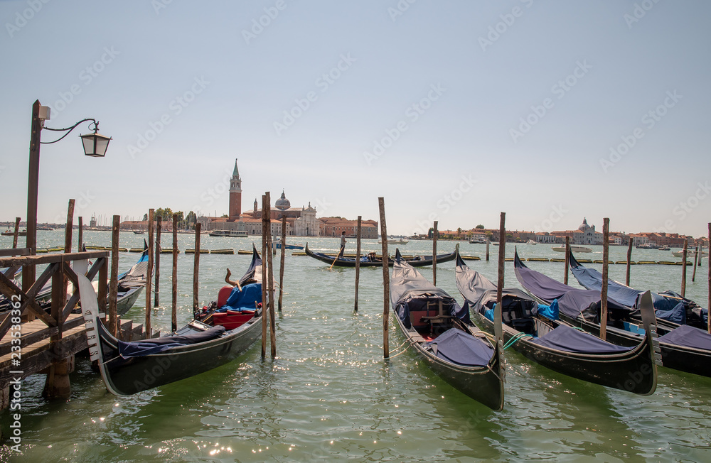 View of the Venetian Lagoon with gondolas and Island of St. George in the background, Venice, Veneto, Italy