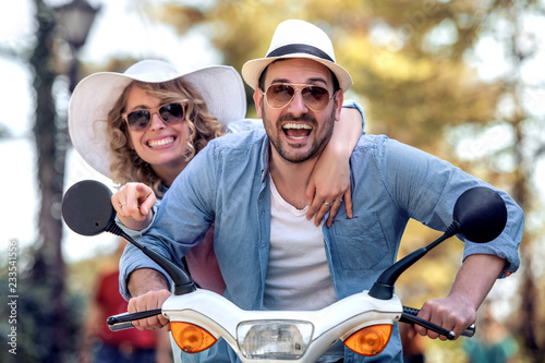 Couple in love riding a motorbike