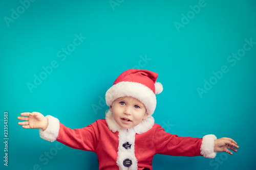Portrait of child wearing Santa Claus costume