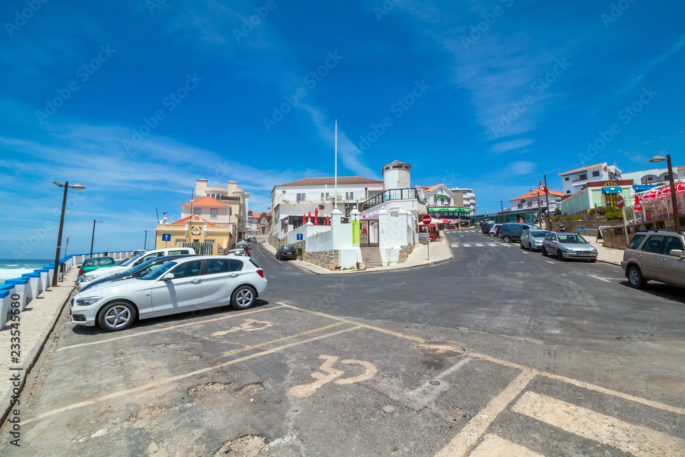 Nazare, Portugal - June 6, 2016: a view of one of the most beautiful city in Portugal - Nazare. Shops and restaurant in background Nazare, Portugal - June 6, 2016: a view of one of the most beautiful city in Portugal - Nazare. Shops and restaurant in background