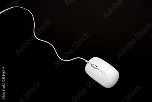 Computer mouse on black background