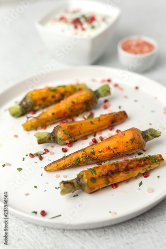 Healthy roasted carrots On white background