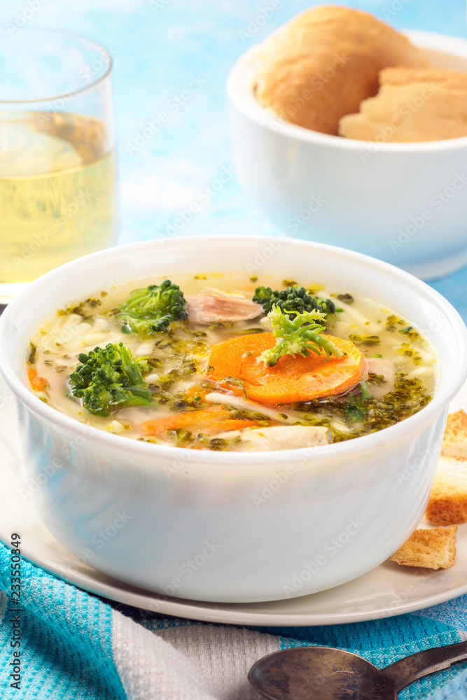 Italian vegetable soup with broccoli carrots and noodles in chicken broth Italian vegetable soup with broccoli carrots and noodles in chicken broth