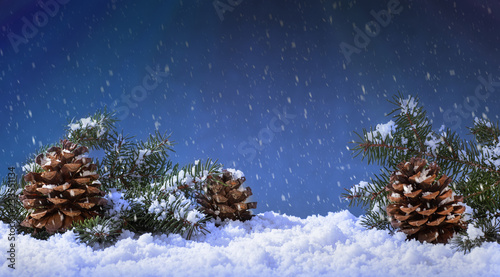 Holiday Snowfall onto Pine Cones and Evergreen Tree Branches