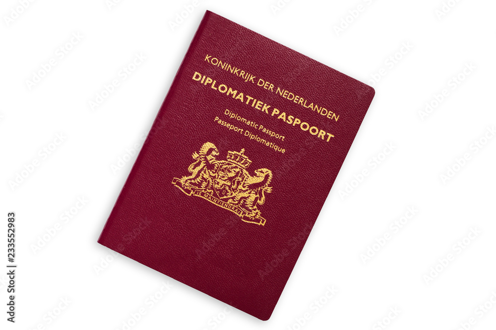 Holland red diplomatic passport isolated on white background Holland red diplomatic passport isolated on white background